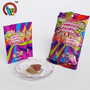 Piruleta con forma de mano con caramelo mágico