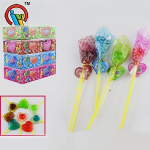 caramelo frutal con forma de corazón de la piruleta doble