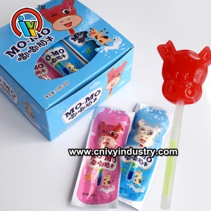 Dulces de paleta fluorescente en forma de vaca.