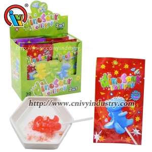 Piruleta de dulces de dinosaurio con caramelo de popping