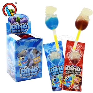 Caramelo de piruleta ligera con forma de dinosaurio