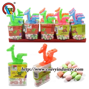 caramelo de juguete de dinosaurio con silbato