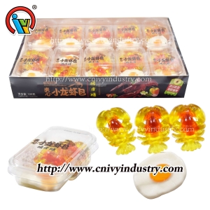 Caramelo de goma con forma de huevo escalfado de cigalas
